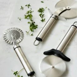 Heirol Steely Pizza Cutter -Gubi Furni Sales heirol steely pizza cutter 1